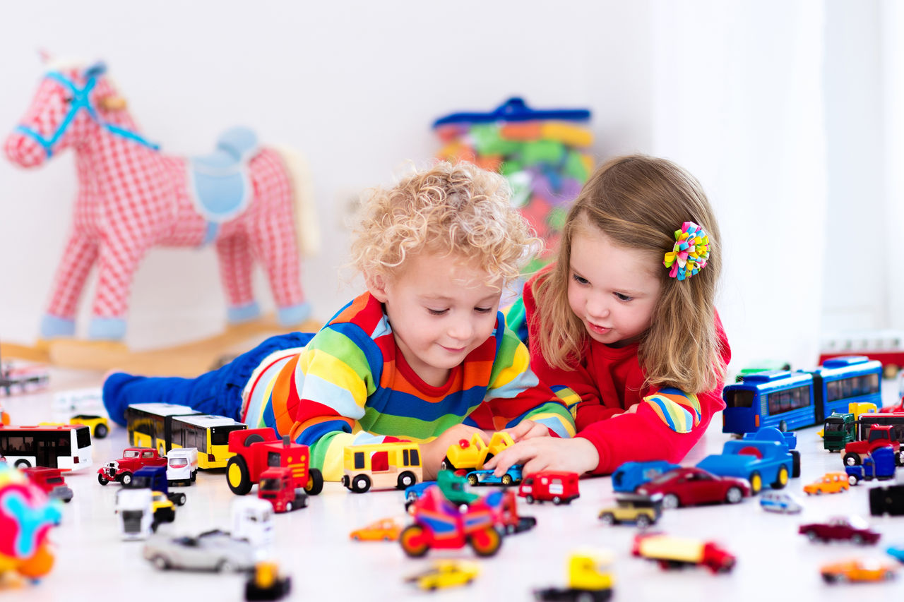 Girls playing toys