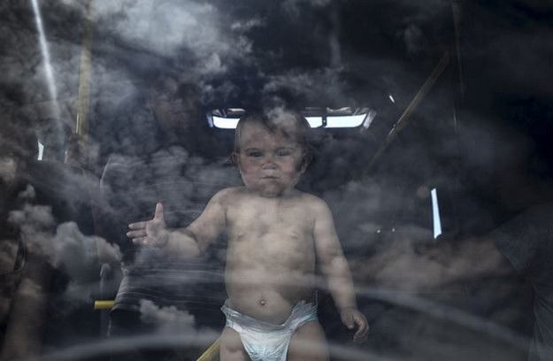 Un fotograf rus a realizat unele din cele mai impresionante fotografii despre războiul din Ucraina