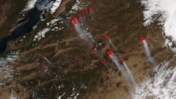 Спутник NASA получил новые фотографии лесных пожаров в Сибири