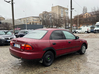 Mazda 323 foto 4