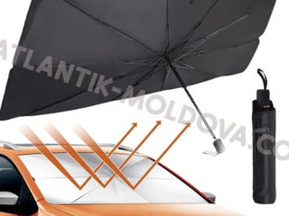 Солнцезащитный складной зонт для автомобиля.