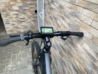 Bicicletă electrică foto 4