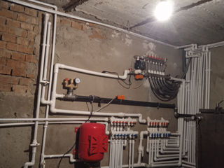 Lucrări de instalare sistem de încălzire,apeduct și canalizare.
