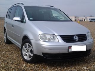 Volkswagen Touran foto 1