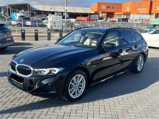 BMW 3 Series Touring foto 2