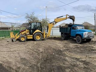 Lucrari cu excavatoru și kamaz foto 7