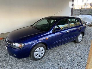 Nissan Almera foto 1