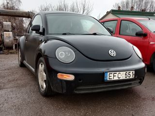 Volkswagen New Beetle foto 1