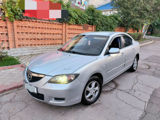 Mazda 3 foto 1