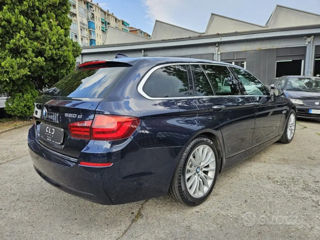 BMW 5 Series foto 2