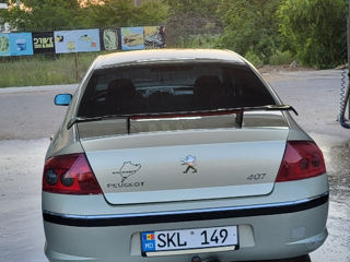 Peugeot 407 foto 1