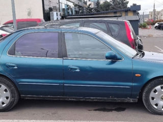 KIA Clarus фото 2