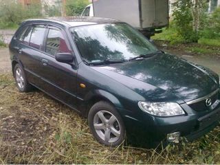 Mazda 323 foto 1