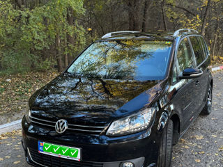 Volkswagen Touran foto 2