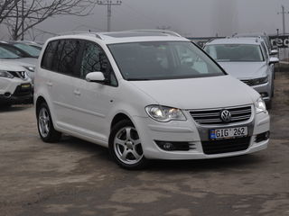 Volkswagen Touran foto 1