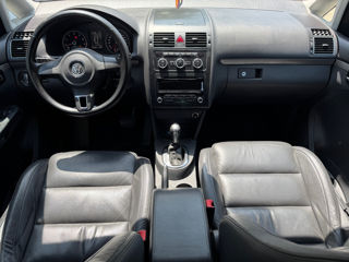 Volkswagen Touran фото 6