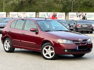 Nissan Almera foto 1