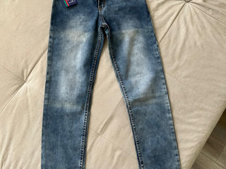 Новые джинсы на мальчика 9-11 лет