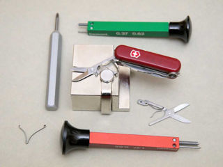 We change the spring of scissors on the Victorinox knives all types. foto 2