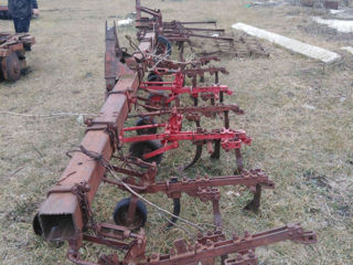 MTZ 102 . Agretatele aparte ,plug,discuri,stropitoare,samanatoare,cultivator foto 7