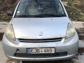 Toyota Passo,Daihatsu Sirion,Subaru Justy. foto 2