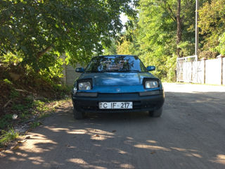 Mazda 323 foto 1