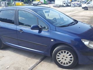 Peugeot 307 foto 1