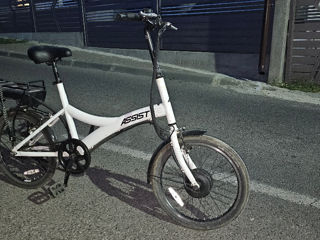 Vind bicicletă electrica practic noua 385€ foto 1