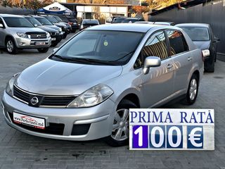 Nissan Tiida foto 1