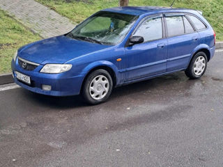 Mazda 323 foto 1