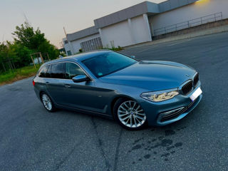 BMW 5 Series Touring foto 1