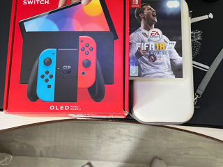 Vând nintendo switch oled nou cu o joacă fifa 18 și cu o husă de purtat