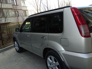 Nissan X-Trail foto 1