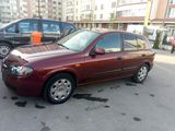 Nissan Almera foto 1