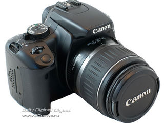 Зеркальный японский полупрофессиональный фотоаппарат Canon foto 1