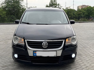 Volkswagen Touran фото 6