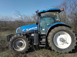 Трактор NewHolland t6070 foto 2