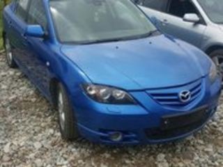 Mazda 3 foto 1