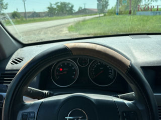 Opel Astra фото 7