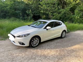 Mazda 3 foto 1