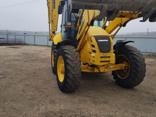 Эксковатор Komatsu  WB93S foto 6