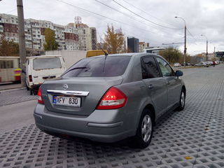 Nissan Tiida foto 1