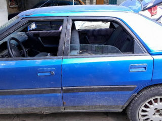 Mazda 323 foto 4