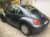 Volkswagen New Beetle foto 1