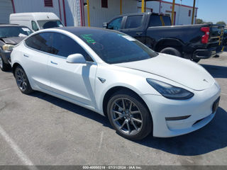 Tesla Model 3 foto 1