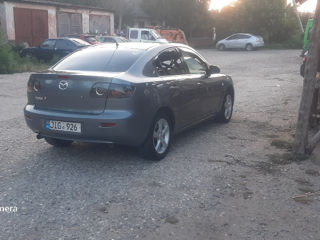 Mazda 3 foto 1