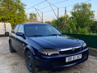 Mazda 323 фото 0