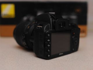 Nikon D3100 Full Kit (6000 de cadre) foto 2