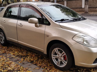 Nissan Tiida фото 2