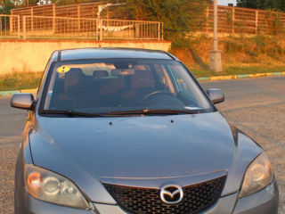 Mazda 3 foto 1